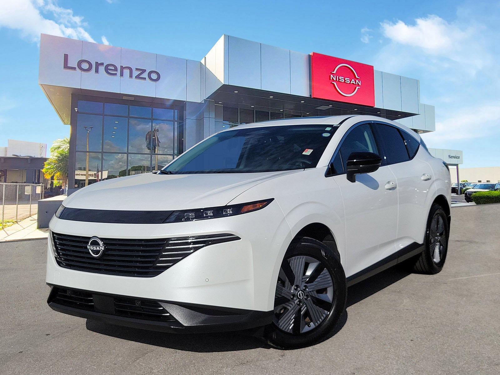 2025 Nissan Murano SL in Everest White Pearl Tricoat — front three-quarter view