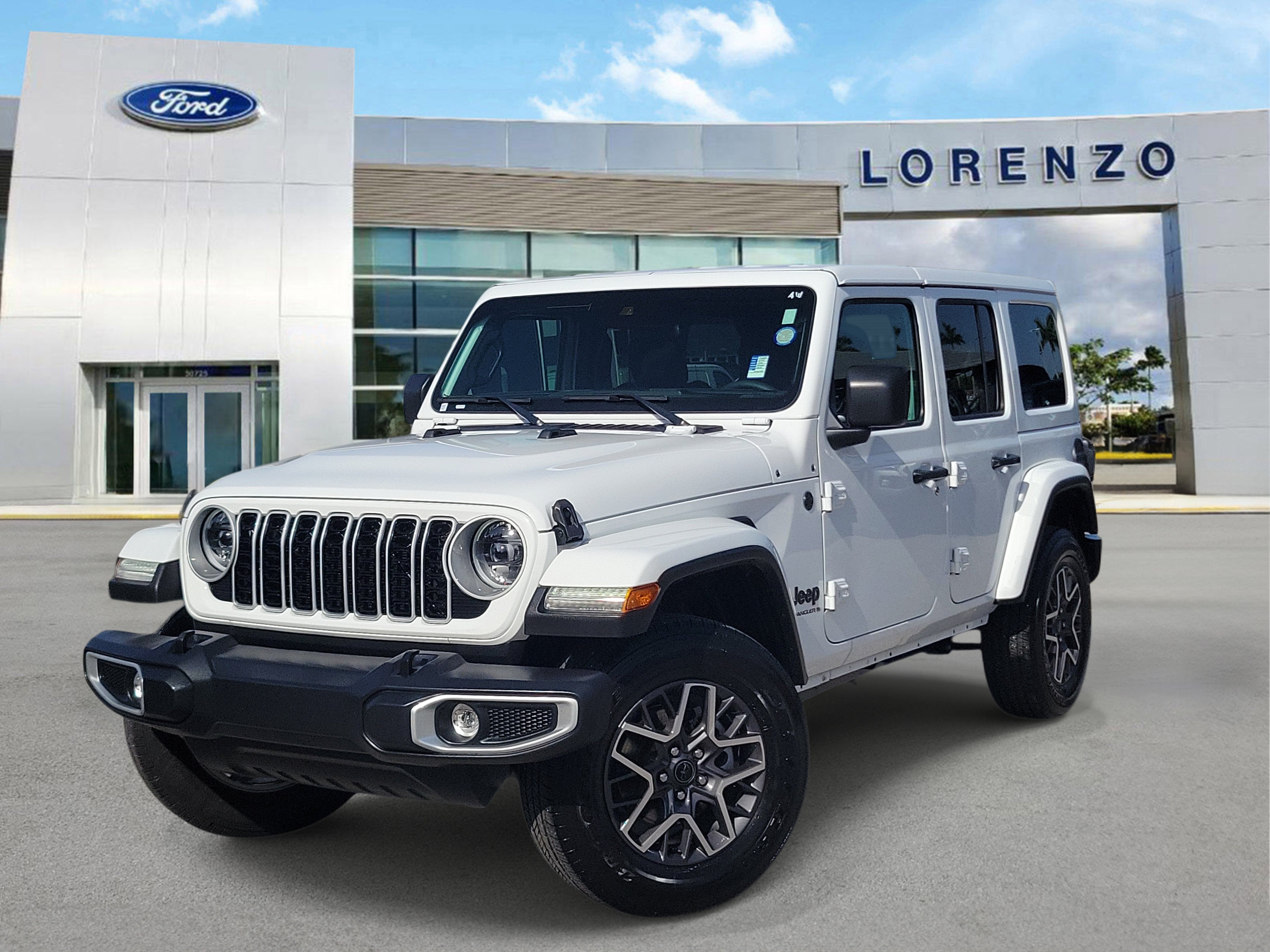 2025 Jeep Wrangler Sahara in Bright White Clearcoat — front three-quarter view